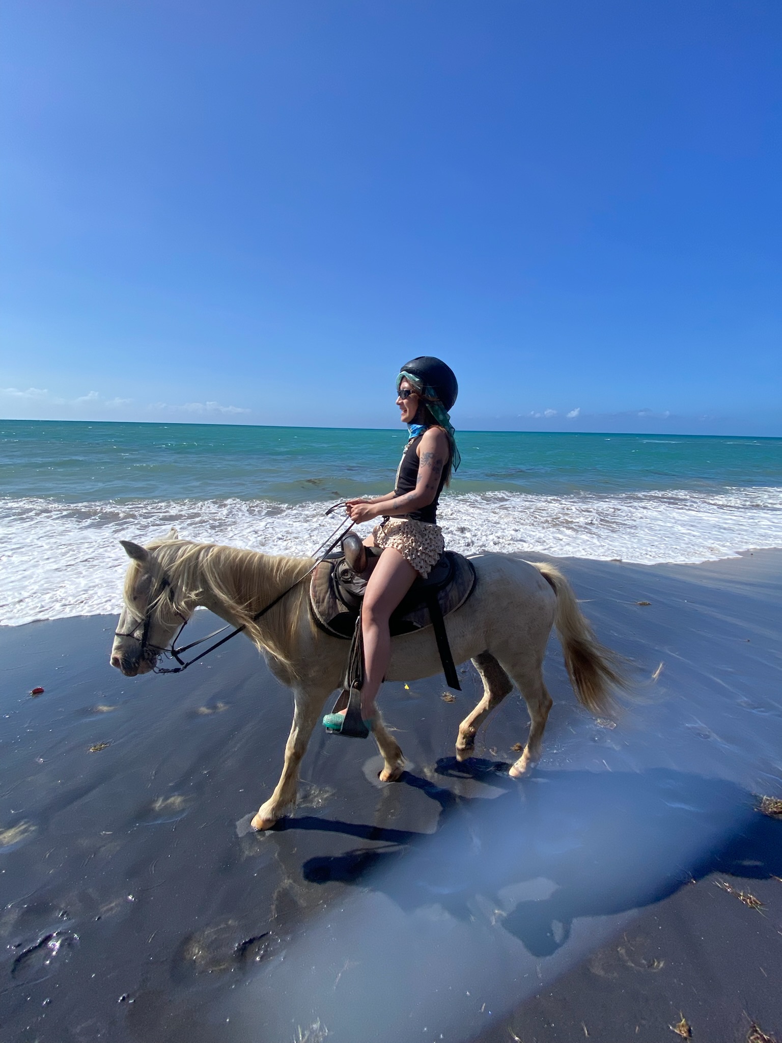 me on a horse on a beach